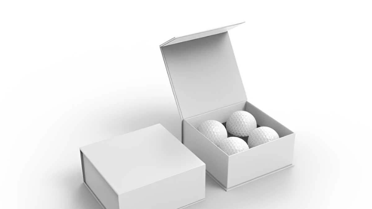 White folding box mockup holding golf balls